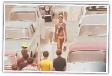  ??  ?? A Meter Maid does the rounds in Surfers Paradise in 1971. Picture: 7NEWS