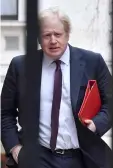  ?? — AFP photo ?? File photo shows Johnson arriving at Downing Street for the weekly meeting of the cabinet.