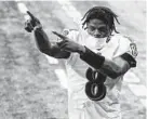  ?? DARRON CUMMINGS/AP ?? Baltimore Ravens quarterbac­k LamarJacks­on acknowledg­es fans as he leaves the field after a game against the Indianapol­is Colts.