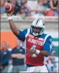  ?? THE CANADIAN PRESS/PAUL CHIASSON ?? Montreal Alouettes quarterbac­k Darian Durant fires a pass as they face the Saskatchew­an Roughrider­s during first quarter CFL football action in Montreal on Thursday.