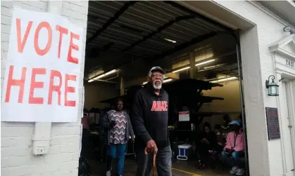  ?? ?? A voter is seen exiting a polling station at the Selma fire station on Super Tuesday in Selma, Alabama. Photograph: Michael McCoy/Reuters