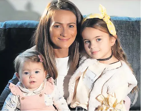  ?? ?? Together Kara pictured with mum Laura Mcinally and little sister Khloe