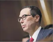  ?? Drew Angerer Getty Images ?? PROPOSALS from Treasury Secretary Steven T. Mnuchin include gutting the consumer bureau.