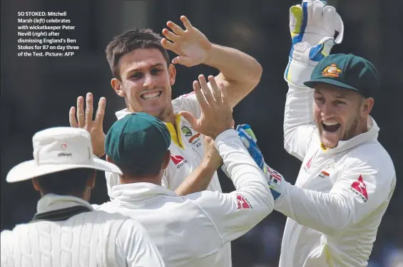  ??  ?? SO STOKED: Mitchell Marsh ( left) celebrates with wicketkeep­er Peter Nevill ( right) after dismissing England’s Ben Stokes for 87 on day three of the Test. Picture: AFP