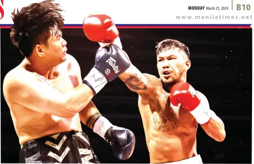  ?? PHOTO BY RIO DELUVIO ?? Filipino Eumir Felix Marcial (right) fights Thai Thoedsak Sinam in their 8-round, super middleweig­ht bout on Saturday, March 23, 2024, at the Ninoy Aquino Stadium in Malate, Manila.