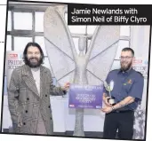  ??  ?? Jamie Newlands with Simon Neil of Biffy Clyro