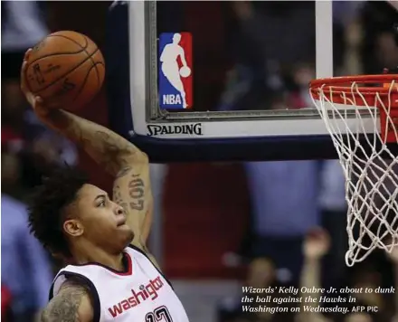  ?? AFP PIC ?? Wizards’ Kelly Oubre Jr. about to dunk the ball against the Hawks in Washington on Wednesday.