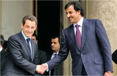  ?? Eric Feferberg / AFP ?? Nicolas Sarkozy pictured with Qatar’s Sheikh Tamim in 2010 at the Elysee Palace in Paris