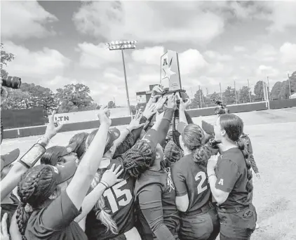  ?? COURTESY OF UCF ATHLETICS ?? UCF softball captured its first AAC tournament championsh­ip since 2015 in convincing fashion with an 11-0 victory over USF in Greenville, N.C., Saturday.