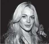  ?? KEVIN MAZUR/GETTY 2013 ?? Lindsay Lohan is a hotelier and kindergart­en teacher supervisin­g hard-drinking hard bodies in “Beach Club.”