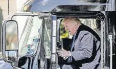  ?? AP ?? President Donald Trump pretends to drive an 18wheeler during a meet with truckers and CEOs at the White House on Thursday.