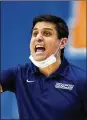  ?? KATHY KMONICEK/ ASSOCIATED PRESS ?? UNC-Greensboro head coach Wes Miller directs his team against Mercer in the second half of the Southern Conference tournament championsh­ip game on March 8 in Asheville, N.C.