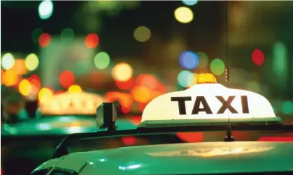  ?? Photograph: John W Banagan/Getty Images ?? New fines: the NSW government has encouraged passengers to report poor behaviour by drivers to the taxi hotline.