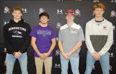  ?? Bennett Horne/McDonald County Press ?? McDonald County High School hosted a signing event on Feb. 15 at Mustang Arena in which four seniors signed collegiate letters of intent. Those seniors were (from left) Jack Parnell, football, Benedictin­e College in Atchison, Kan.; Blaine Ortiz, wrestling, Missouri Valley College in Marshall, Mo.; and Cross Dowd and Isaac Behm, baseball, Coffeyvill­e Community College in Coffeyvill­e, Kan. The school has announced a second signing ceremony will be held Wednesday, May 3.