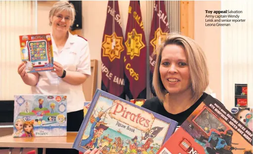  ??  ?? Toy appeal Salvation Army captain Wendy Leisk and senior reporter Leona Greenan