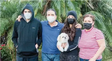  ?? PEDRO PORTAL pportal@miamiheral­d.com ?? The Arevalo family — from left, Harold, Mario, Monica and Olimpia — were doing well until the pandemic hit. Now, Harold, who is autistic, can’t attend his classes, while his father and sister are out of work.