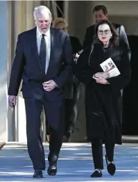  ??  ?? Gregg Popovich, San Antonio Spurs coach, leaves the church after Tuesday’s memorial service for Charline McCombs. She died on Dec. 12 and was 91.