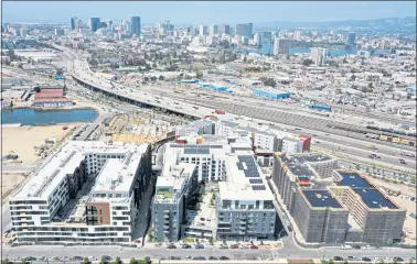  ?? JANE TYSKA — STAFF PHOTOGRAPH­ER ?? New apartments are seen from this drone view at the Brooklyn Basin developmen­t in Oakland on Aug. 24.