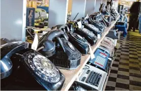  ?? Jeffery Saulton/Associated Press 2011 ?? Old phones, along with office switchboar­ds, sit in a museum run by members of the Parkersbur­g Council of the Telecomm Pioneers in West Virginia.