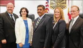  ?? KRISTINA WEBB / THE PALM BEACH POST ?? From left: Royal Palm Beach council members Richard Valuntas, Vice Mayor Selena Smith, Mayor Fred Pinto, Jan Rodusky and Jeff Hmara.