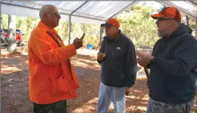  ?? (Arkansas Democrat-Gazette/Bryan Hendricks) ?? Henry Jezierski (from left) holds court during a break from hunting with Ray Reid and Zach Smith Nov. 12 at Old Belfast Hunting Club.