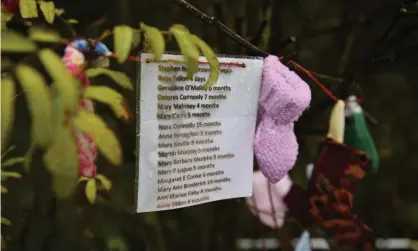  ??  ?? A burial shrine with the names of babies who died at the Tuam maternity home in Galway. Almost 800 children died without burial records at the home. Photograph: Charles McQuillan/Getty Images