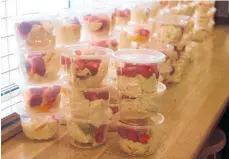  ?? ?? And finally the fruit salad and pavlova desserts completed the delivery package.