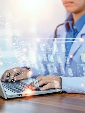  ?? GETTY IMAGES ?? New technology is allowing doctors to use artificial intelligen­ce to keep notes during patient appointmen­ts as well as helping them craft messages to their patients.