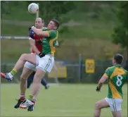  ??  ?? Seamus O’Sullivan (Dromtariff­e) and Billy O’Gorman (Boherbue) in a tangle during the Ducon Cup semi final