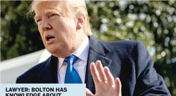  ?? ANDREW HARNIK/AP ?? President Donald Trump speaks to reporters Friday on the South Lawn of the White House.