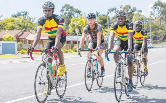  ?? Picture: JERAD WILLIAMS ?? Craig Pearman guides Ghana’s cyclists Abdul Razak Umar, Abdul Razak Abdul Mumin and Boakye Dankwa Anthony Boafo around the Coast.