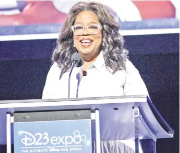  ??  ?? Oprah Winfrey, chief executive officer of Oprah Winfrey Network, speaks during the Disney Legends Awards at the D23 Expo 2017 in Anaheim, California. — WP-Bloomberg Bloomberg photo by Patrick T. Fallon