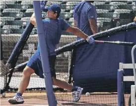  ?? JONATHAN DANIEL/GETTY IMAGES ?? The Cubs’ Anthony Rizzo (taking batting practice and working out last weekend) was held out again Tuesday and underwent an MRI exam for back issues.