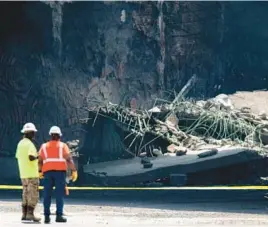  ?? MONICA HERNDON/THE PHILADELPH­IA INQUIRER ?? Debris is seen at the collapsed portion of Interstate 95 in Philadelph­ia on Sunday. A truck fire and partial road collapse have closed I-95 in both directions in northeast Philadelph­ia.