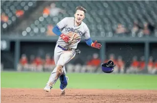  ?? ASSOCIATED PRESS FILE PHOTO ?? The Blue Jays aren’t planning to move Cavan Biggio from second base, but they may take a look at him in centre field this spring, if only to give manager Charlie Montoyo more options.
