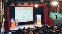  ?? PHOTO BY SHANNON LABARE ?? During the inaugural Downtown Bakersfiel­d Symposium Wednesday at The Ovation Theatre, the local head of Adventist Health, Daniel Wolcott, speaks about the hospital company’s plans to develop a new medical tower along Chester Avenue.