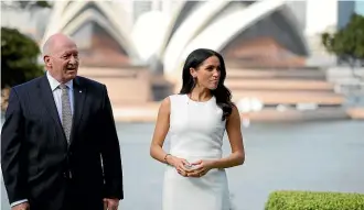  ?? AP ?? Meghan, Duchess of Sussex, walks with Australia’s Governor General Peter Cosgrove in the gardens at Admiralty House in Sydney.