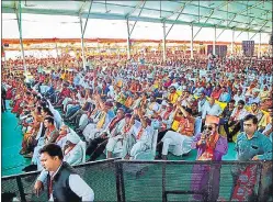  ?? ?? BJP supporters attend a public meeting addressed by PM Narendra Modi in Surendrana­gar.