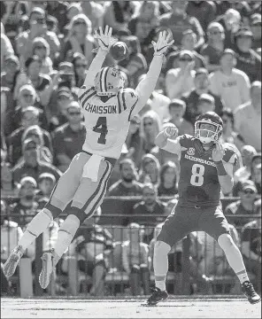  ?? NWA Democrat-Gazette/BEN GOFF ?? Austin Allen gets off a pass between the outstretch­ed arms of LSU linebacker K’Lavon Chaisson. Allen completed 13 of 23 passes for 140 yards. Teammates said Allen gave a fiery pregame speech to the team. “He’s not a guy that comes out of his shell a...