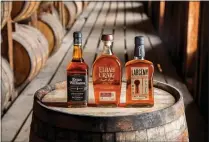  ?? HEAVEN HILL DISTILLERI­ES VIA AP ?? Heaven Hill bourbon whiskeys. Heaven Hill Distillery, one of the world’s largest bourbon producers, plans to revive its whiskey production in its Kentucky hometown — more than a quarter century after a devastatin­g fire destroyed a previous production facility.