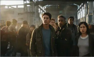  ?? PHOTO COURTESY TWENTIETH CENTURY FOX ?? Shown from left are, Thomas (Dylan O’Brien), Newt (Thomas Brodie-Sangster), Cranks leader Jorge (Giancarlo Esposito), Frypan (Dexter Darden) and Brenda (Rosa Salazar) in “Maze Runner: The Death Cure”