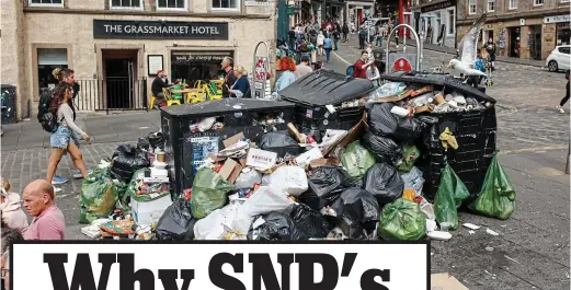  ?? ?? Eyesore: Bins overflow with rubbish in Edinburgh as the city’s refuse collectors strike