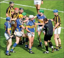  ??  ?? SCUFFLE: Brian Gavin recoils after being hit by Tommy Walsh in the 2011 final