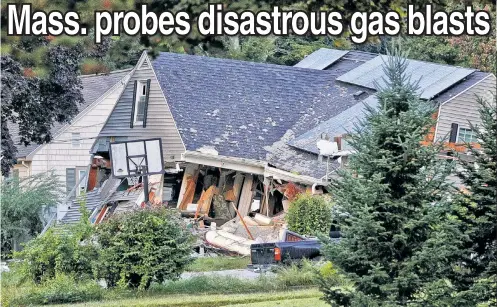  ??  ?? GONE: Massachuse­tts authoritie­s are still looking into how a series of gas explosions destroyed this and other houses on Thursday.