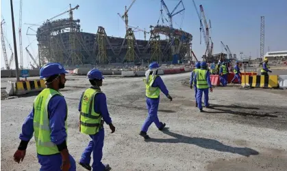  ?? Photograph: AFP/Getty ?? Constructi­on workers at Qatar’s Lusail Stadium. ‘The global spotlight on Qatar has provided an opportunit­y for human rights campaigner­s.’