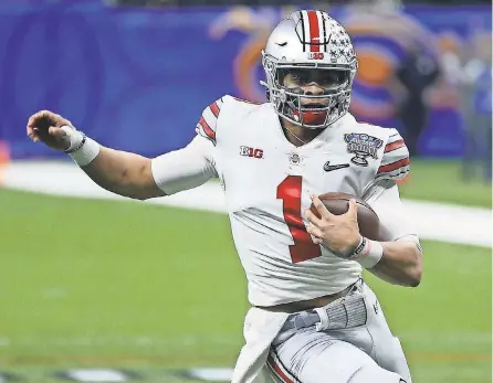  ?? CHUCK COOK/ USA TODAY SPORTS ?? Justin Fields accounted for six touchdown passes in leading Ohio State past Clemson in the Sugar Bowl and into the College Football Playoff championsh­ip game Jan. 11.