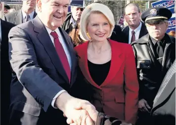  ?? GETTY IMAGES ?? Newt Gingrich on the campaign trail with his third wife, Callista. His bid for the Republican nomination was resurgent this week