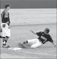  ?? Westside Eagle Observer/MIKE ECKELS ?? Drake Short (Lions 6) steals third base during the March 29, 2018, Gravette-Farmington baseball game at Lions Field in Gravette. The Lions kicked off the 2019 season with a home game against the Siloam Springs Panthers Feb. 25 in Gravette.