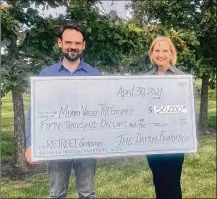  ??  ?? The Dayton Foundation Awards $50,000 Leadership Gift to Miami Valley TREEcovery Campaign for RETREET Project - Pictured - Grady McGahan, RETREET and Jeanne Holihan, The Dayton Foundation.