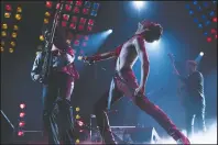  ?? The Associated Press ?? FREDDIE: Gwilym Lee, from left, Rami Malek and Joe Mazzello in a scene from "Bohemian Rhapsody."